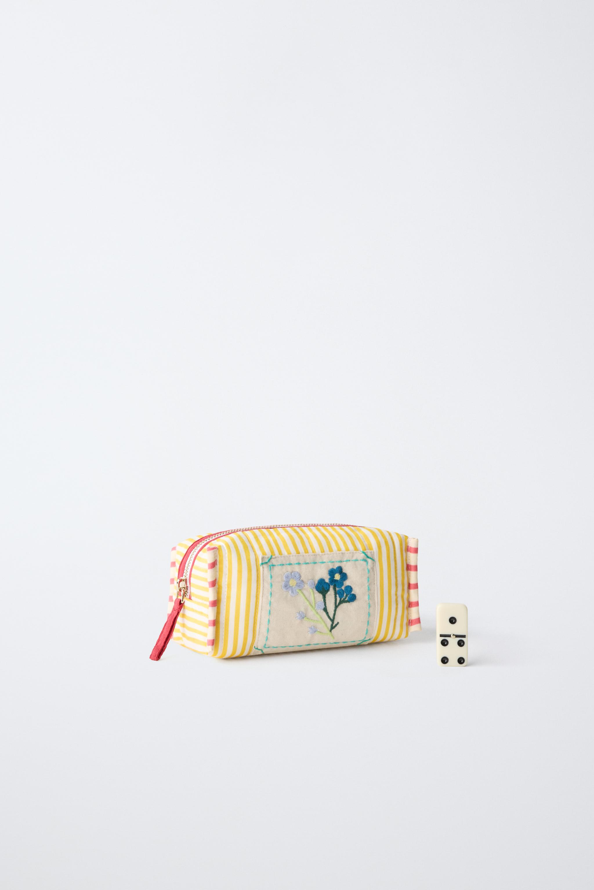 EMBROIDERED STRIPED COSMETICS BAG